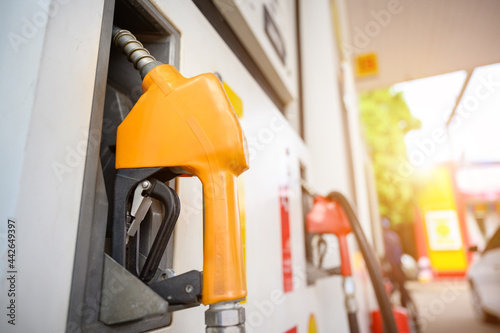 Wallpaper Mural Close-up of some fuel pump nozzles at a gas station or a car filling station. Torontodigital.ca