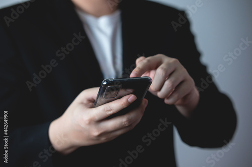 businessman using a mobile smartphone. Communication, online network, telecommunication technology concept.