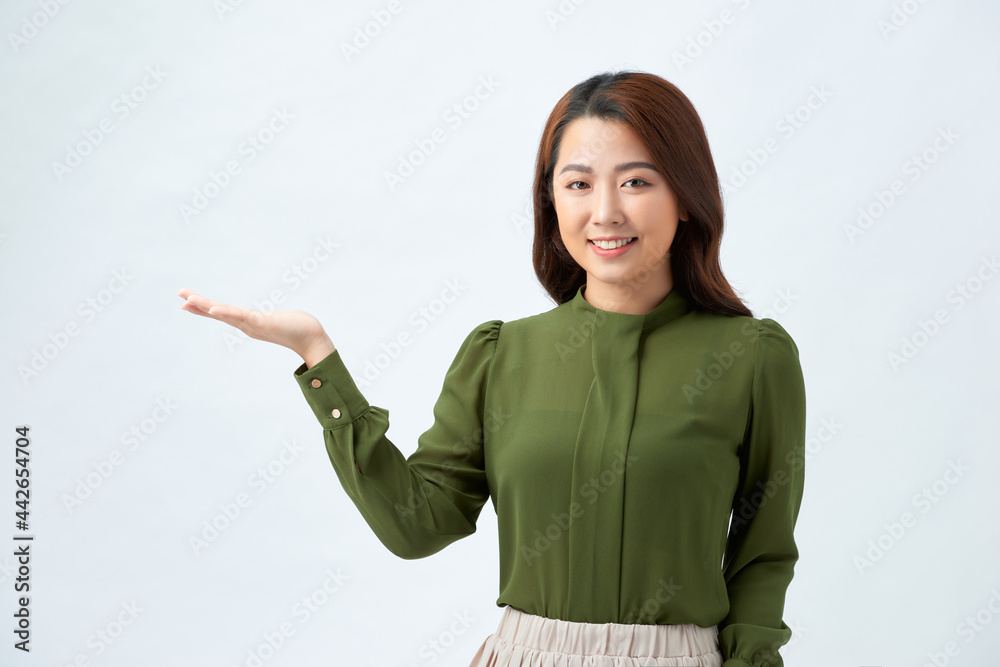 Portrait of beautiful business woman showing copy space over white background Portrait of beautiful business woman showing copy space over white background