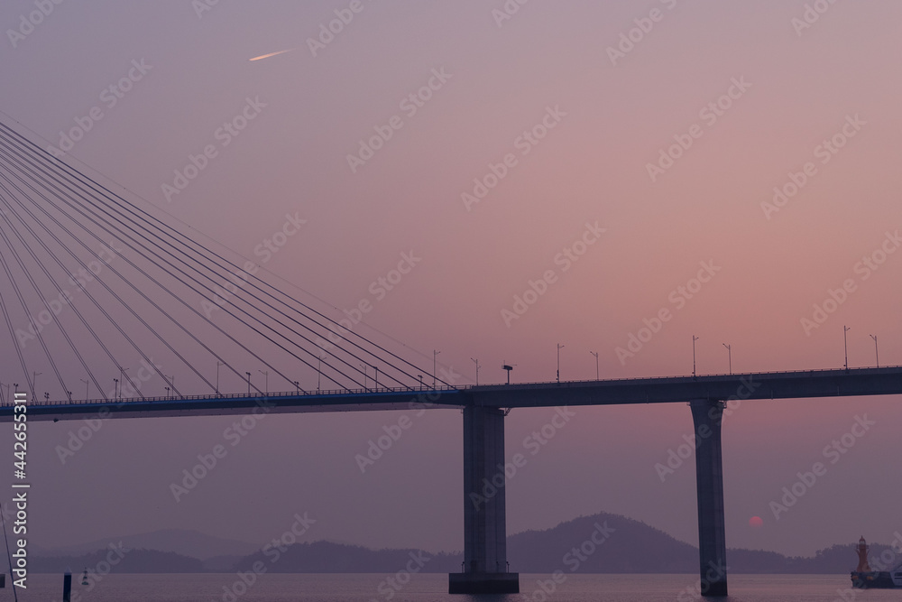 bridge with purple sunset