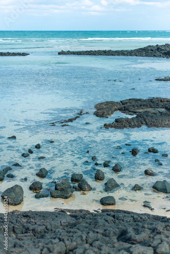 black rock in transparency water