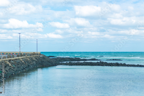 cloudy blue sky and ocean