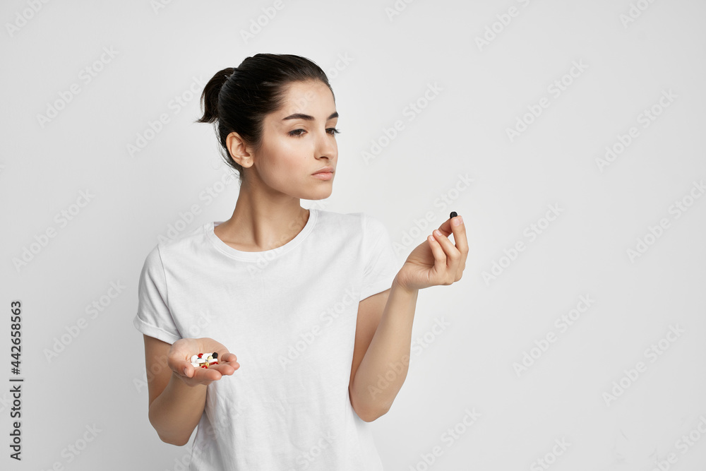 woman with pills in hands therapy medicine lifestyle woman with pills in hands therapy medicine lifestyle