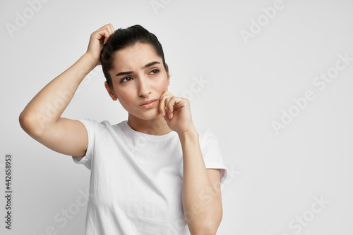 woman in white t-shirt health problem migraines health medicine treatment depression