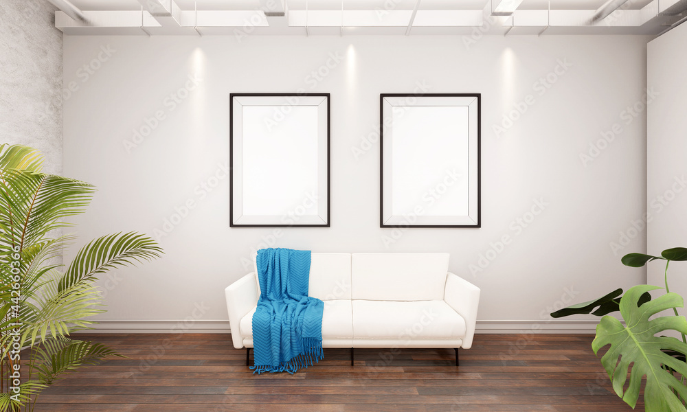 The living room is decorated with chairs, sofaand picture frames,. The living room is decorated with chairs, sofaand picture frames,.