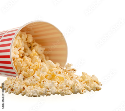 Bucket with tasty popcorn on white background