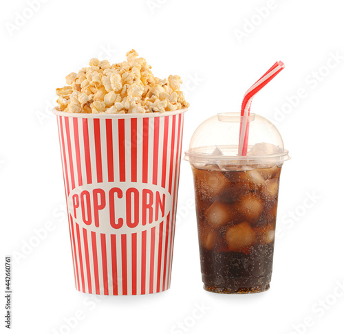 Bucket with tasty popcorn and cola on white background