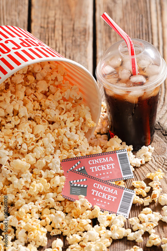 Bucket with tasty popcorn, ...