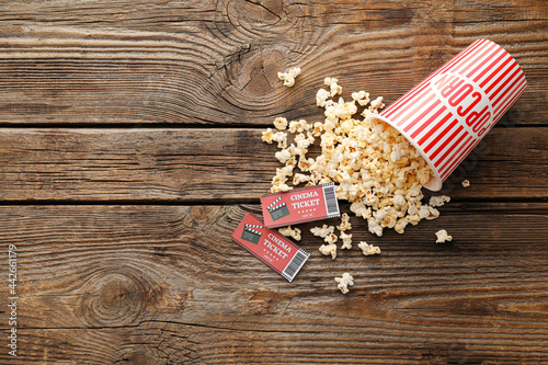 Bucket with tasty popcorn a...