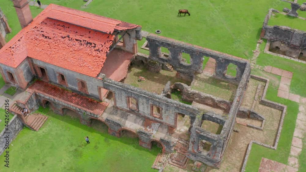 Aerial View Of Ruins Of The Nigua Sugar Mill Or Ingenio Boca de Nigua At Daytime In Dominican Republic - drone shot Aerial View Of Ruins Of The Nigua Sugar Mill Or Ingenio Boca de Nigua At Daytime In Dominican Republic - drone shot