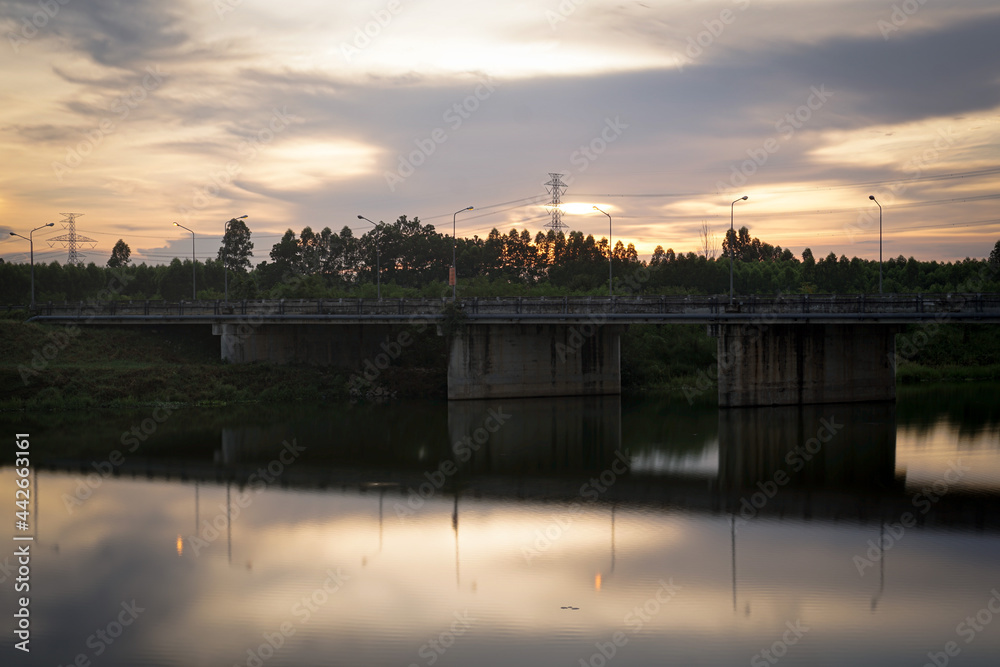 bridge for transportation with sunset sky