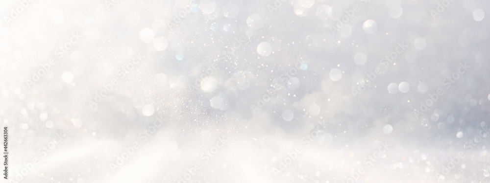 abstract glitter silver and gild lights background. de-focused
