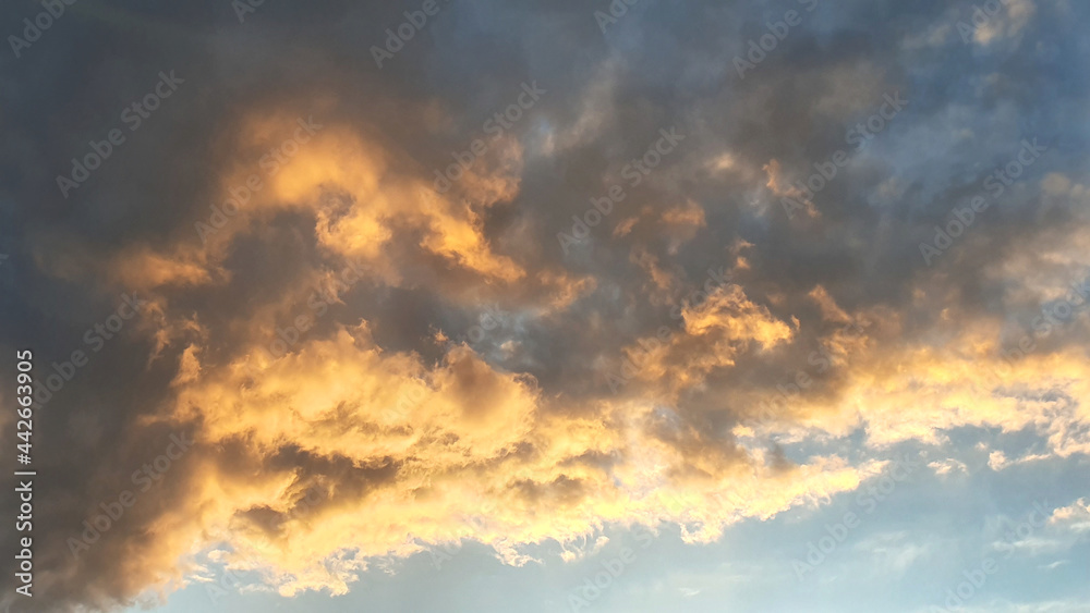 Golden Sunset, Sunset sky, sky background, picturesque sunset sky landscape with dramatic orange clouds. Sunset sky, sky background, picturesque sky
