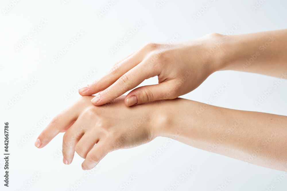 female hands skin care moisturizing medicine close-up