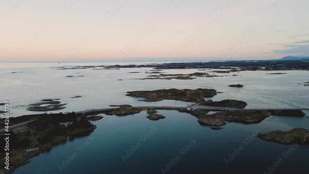 Flying Towards Coastal Highway Of Atlantic Ocean Road In Atlanterhavsveien, Norway During Sunset. - Aerial Shot Flying Towards Coastal Highway Of Atlantic Ocean Road In Atlanterhavsveien, Norway During Sunset. - Aerial Shot