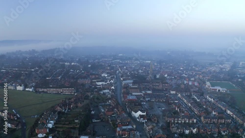 Wallpaper Mural An aerial shot flying above an English town in Surrey on a misty morning. Torontodigital.ca