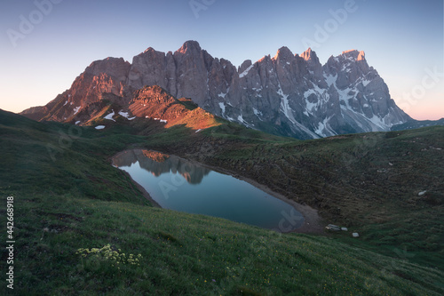 Panoramic morning view of beautiful lake in Dolomiti Alps, South Tyrol, Italy, Europe. Beautiful summer scenery. Magnificent summer view of mountain Lake. Beauty of nature concept background.