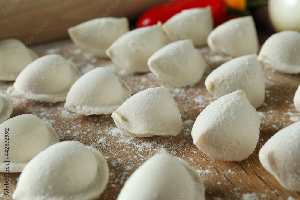 Concept of cooking vareniki or pierogi, close up Concept of cooking vareniki or pierogi, close up
