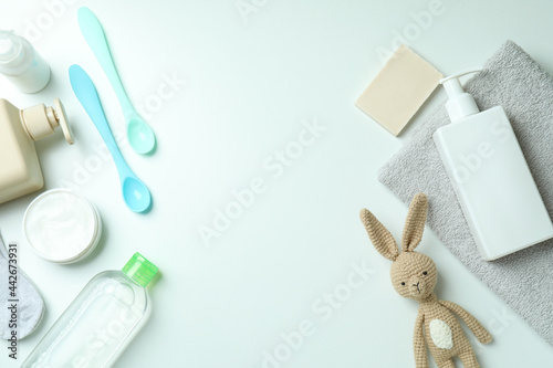 Different baby hygiene accessories on white background