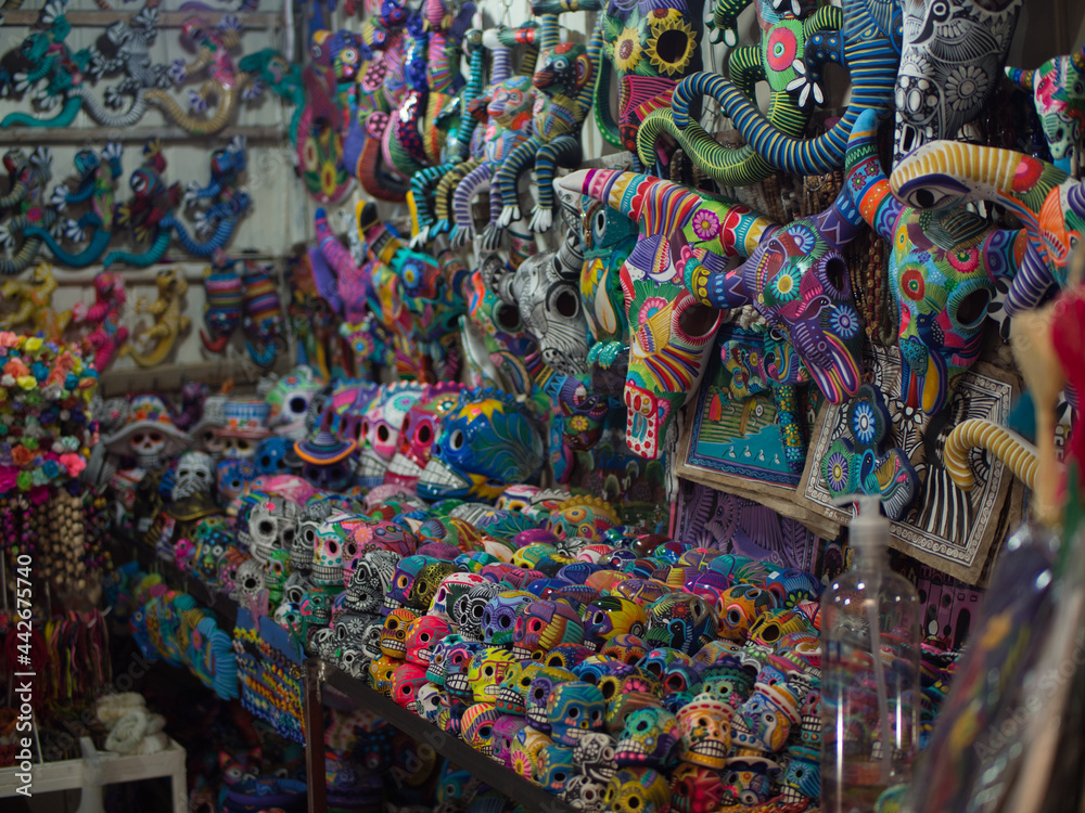 Store with colorful souvenirs (human skulls and cow skulls) in Mexico. San Miguel de Allende, Mexico, February 25, 2021.