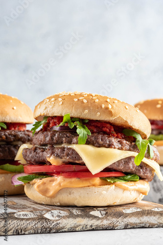 fresh tasty burger on a white background © azurita