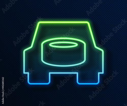 Glowing neon line Spare wheel in the car icon isolated on blue background. Process of replacing the wheel. Storage location of the spare wheel in the trunk. Vector