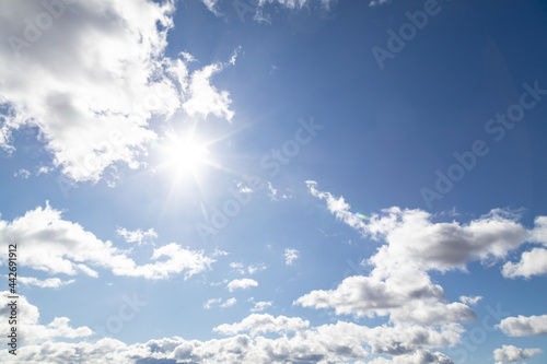 Sunny day sky landscape with clouds.