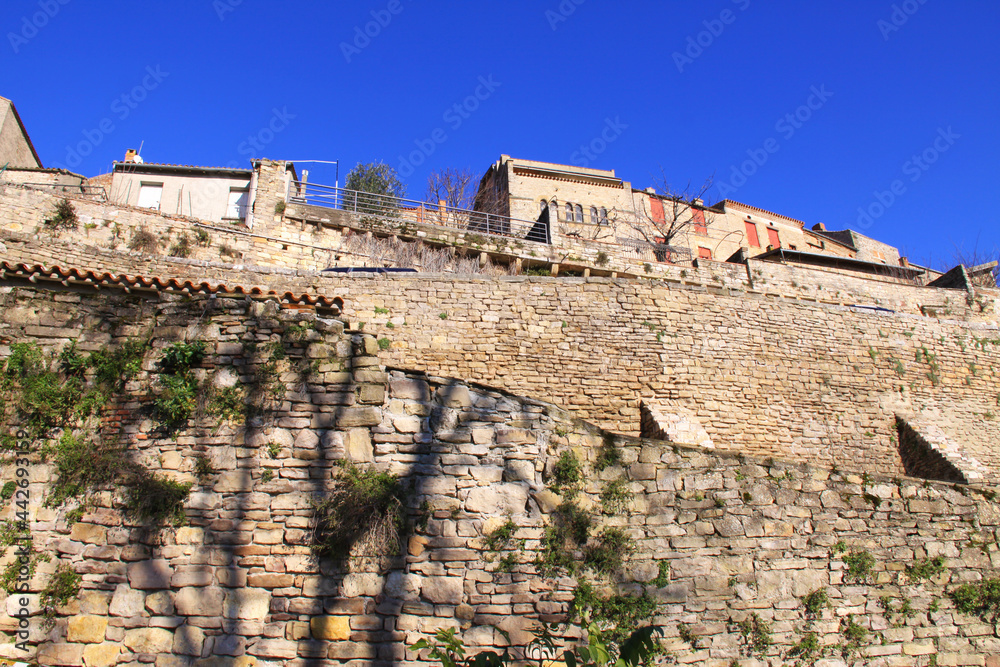 Old town stone wall and blue sky