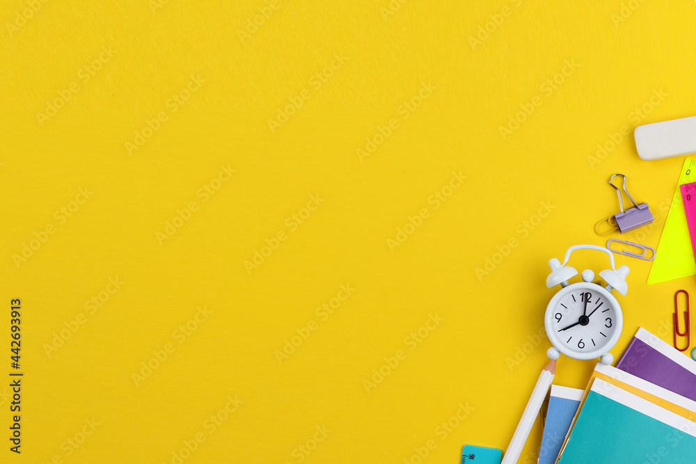Back to school.Yellow background with a place for text with colorful school supplies. Educational concept, preparation for school. Buying and selling, promotions, discounts of office supplies. Back to school.Yellow background with a place for text with colorful school supplies. Educational concept, preparation for school. Buying and selling, promotions, discounts of office supplies.