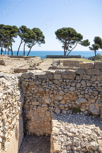 Archaeological Remains of ancient city Empuries. Remains of a Greek rampart. Archaeology Museum of Catalonia, Spain. photo