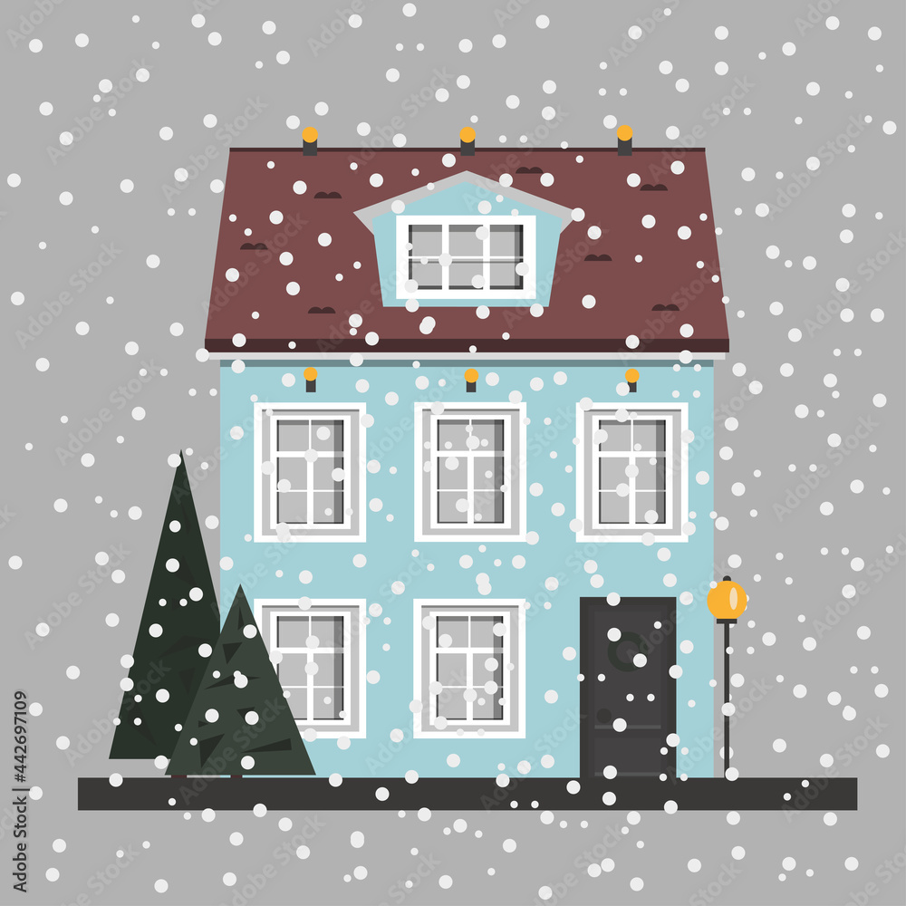 Blue house with Christmas trees and a lantern in winter under a snowfall in Europe