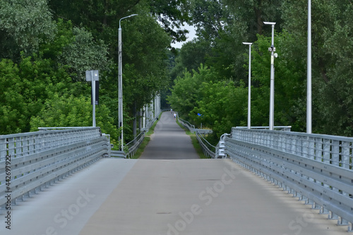 Wallpaper Mural Bridge with railings and path for pedestrians and bicycles. Summer. Day. Torontodigital.ca