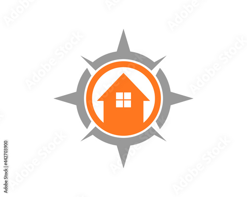 House inside the compass logo