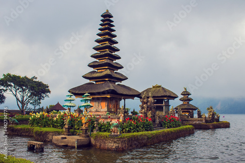 Pura Ulun Danu temple on Lake Beratan near Bedugul mountains. Ulun Danu is a major Shaivite and water temple on Bali  Indonesia. Colorful Balinese landscape  travel and ancient architecture background
