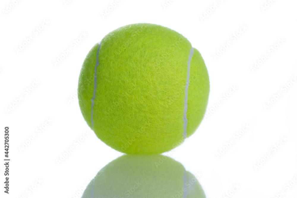 Tennis light green ball on white reflective background