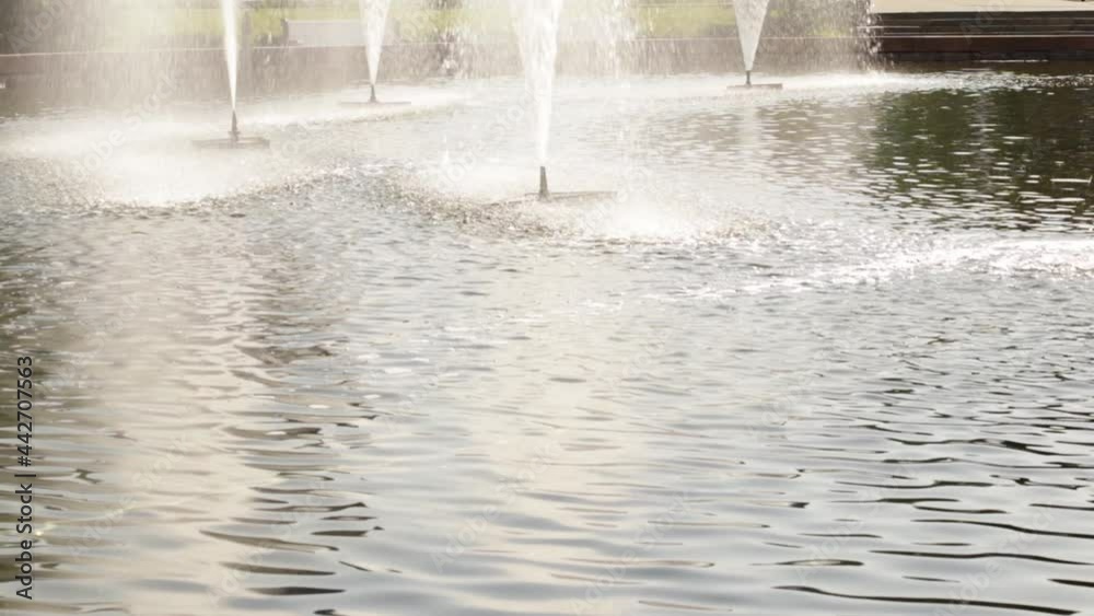 water splashes in the fountain in the city park water splashes in the fountain in the city park