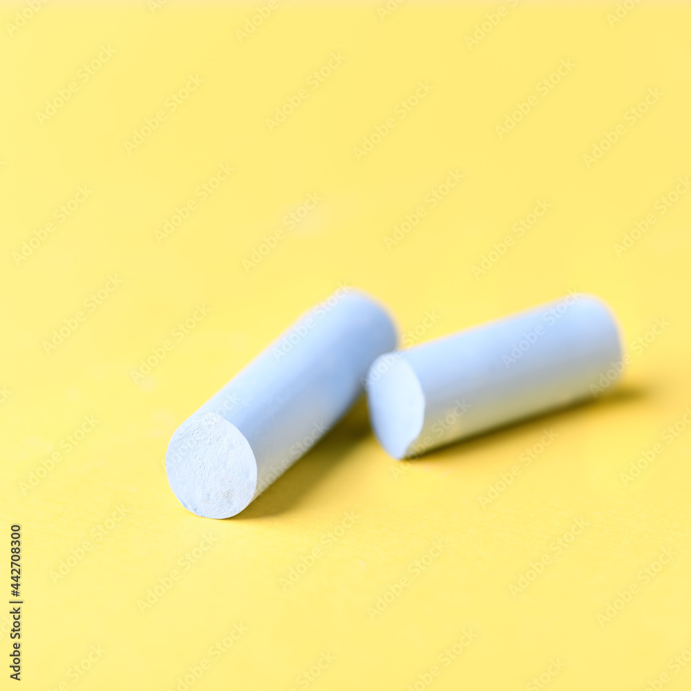 Soft pastels on yellow background. Close up. Copy space. Soft pastels on yellow background. Close up. Copy space.