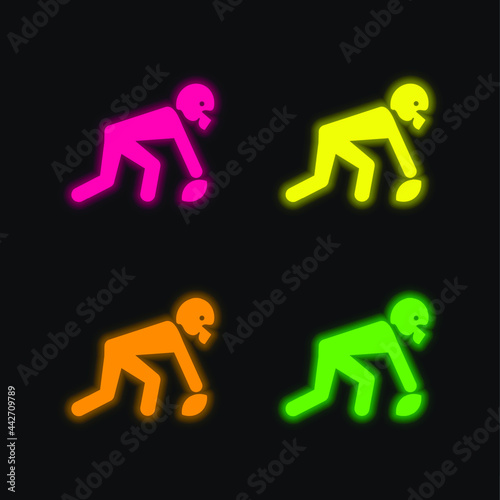 American Football Player Picking The Ball four color glowing neon vector icon © LIGHTFIELD STUDIOS