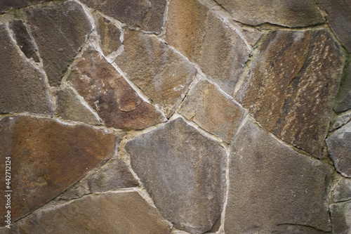 a natural stone. wall, foundation. masonry. large stone