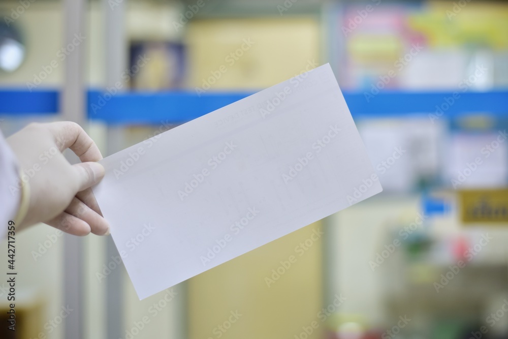 Hand scientist with white card on blur background. Hand scientist with white card on blur background.
