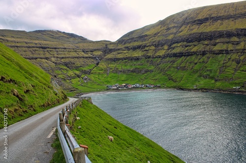 The romantic village of Tjornuvik within the beautiful fjordscape of Faroe Islands © been.there.recently