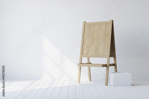 Wooden easel standing in an...