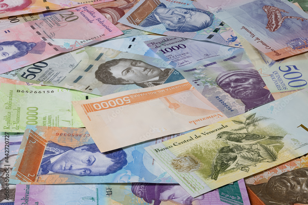 Fototapeta premium Close up to the currency of the south American country Venezuela. High inflation and weak economy increases the denomination of the banknotes. Bolivares or Bolivar money of the republic Venezuela 