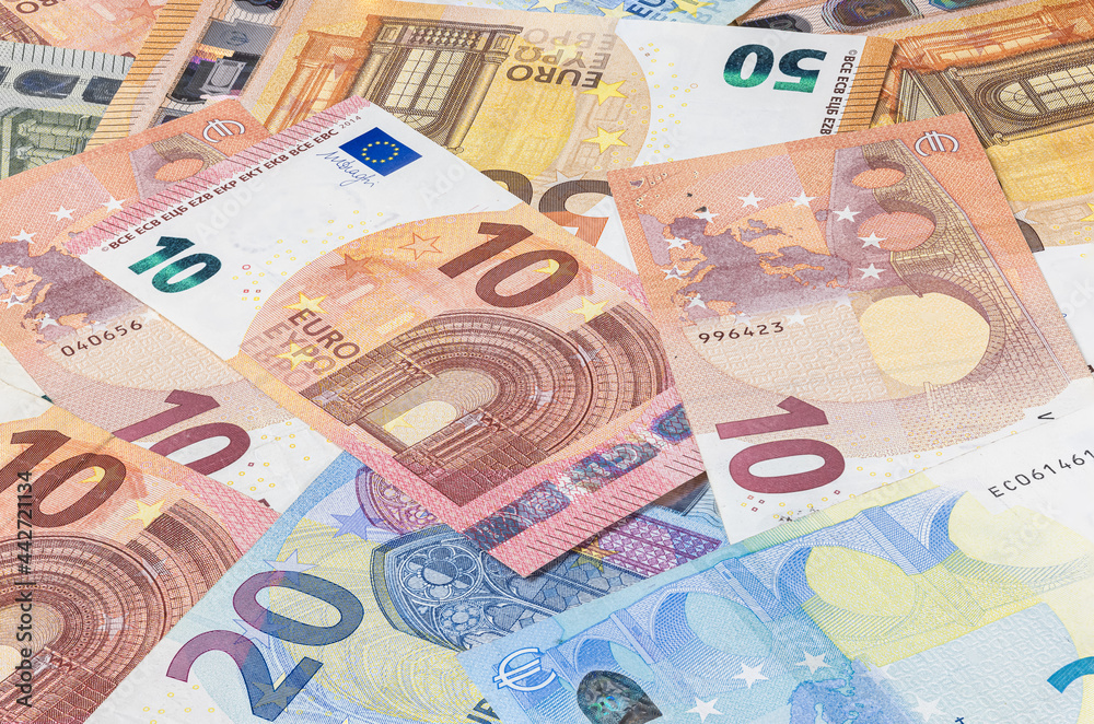 Bunch of euro banknotes. Many Euro bills lie on top of each other. Pile of money of the European Union. Currency of the united Europe. Cash balance of the European Central Bank or ECB. Portraits align Bunch of euro banknotes. Many Euro bills lie on top of each other. Pile of money of the European Union. Currency of the united Europe. Cash balance of the European Central Bank or ECB. Portraits align