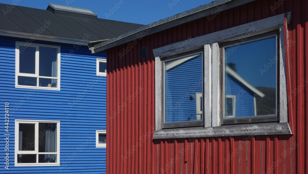 window in colorful buildings and reflection, Sisimut, Greenland window in colorful buildings and reflection, Sisimut, Greenland