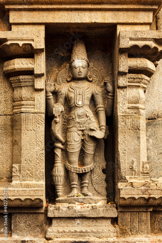 Hindu god Vishnu bas relief in Hindu temple in India photo