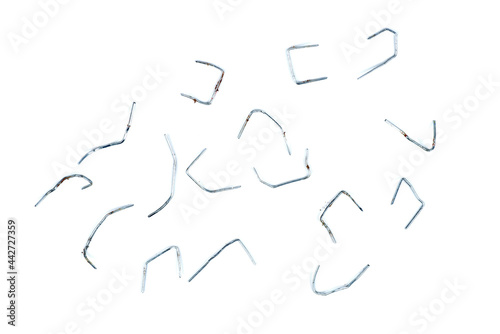 A pile of used staples pin on white background. photo