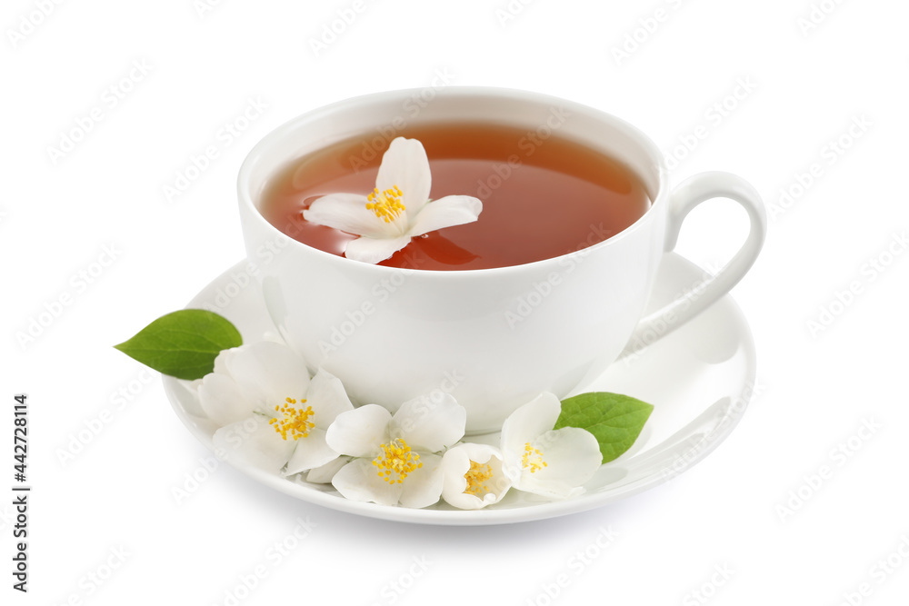 Cup of aromatic jasmine tea and fresh flowers on white background