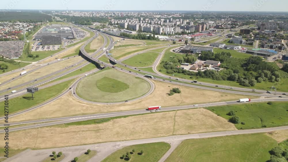 Aerial view of highway intersection in Kaunas, connecting via baltica to Vilnius - Klaipeda highway, major road intersection in Lithuania Aerial view of highway intersection in Kaunas, connecting via baltica to Vilnius - Klaipeda highway, major road intersection in Lithuania
