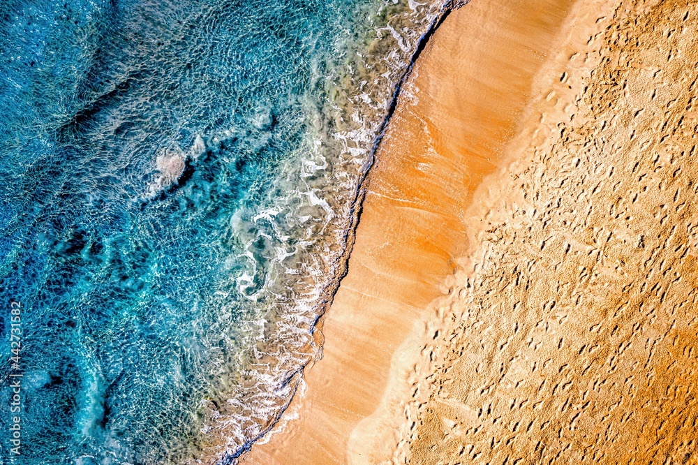 beach and sea of ibiza,  spain. yellow and white sand with blue water
